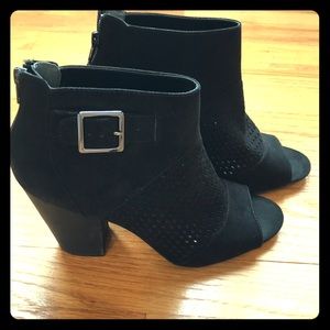 Black open toe booties with mesh accent